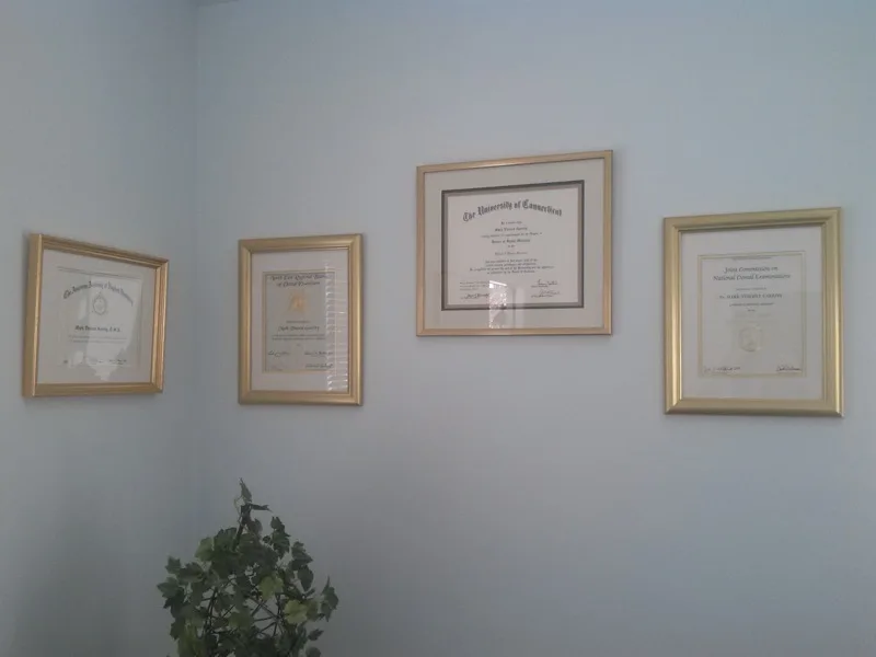 Dr. Garrity's dental degree and board certifications on display